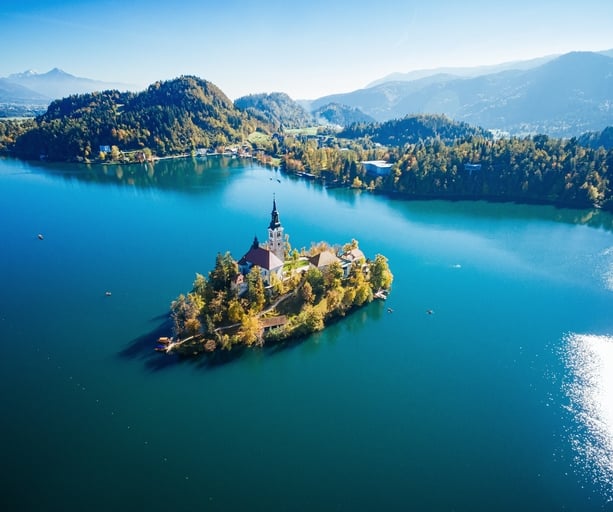 Lake Bled with the Bled island, Gorenjska (Upper Carniolan region), Slovenia. High angle view from drone.