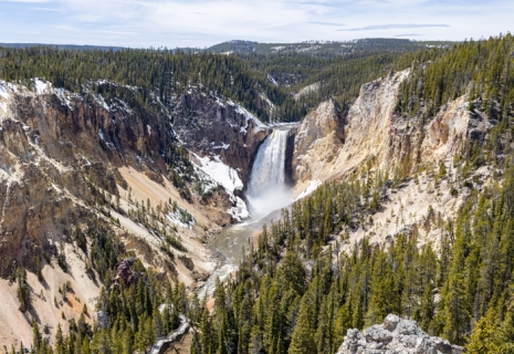 Hot spring, icy lake, nature, wild life, meadow, grand canyon of Yellowstone in Spring 2022