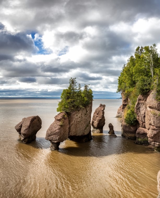 The Hopewell, or Flowerpot Rocks in the Bay of Fundy, New Brunswick, Canada. The area has two tides a day and one of the highest average tides in the world, averaging 16metres.