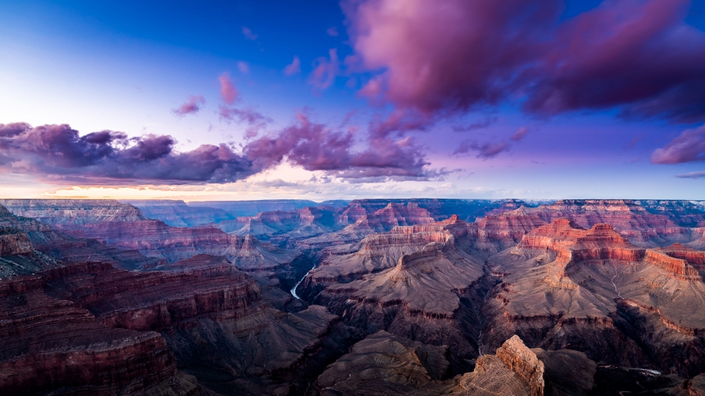 Sweeping view of the Grand Canyon at dusk.