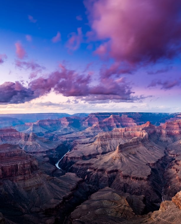 Sweeping view of the Grand Canyon at dusk.
