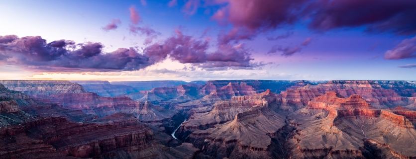 Sweeping view of the Grand Canyon at dusk.