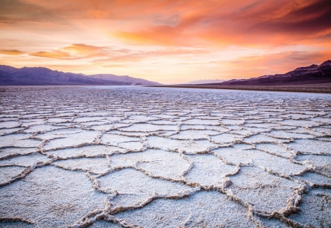 The sunsets over the Badwater landscape in Death Valley National Park.