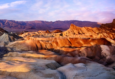 Rippling sand dunes at sunset