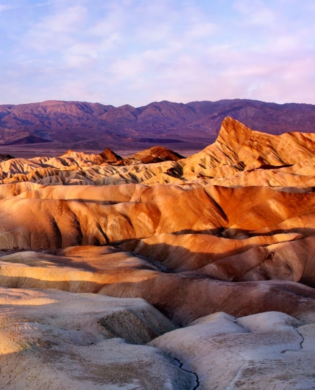 Rippling sand dunes at sunset