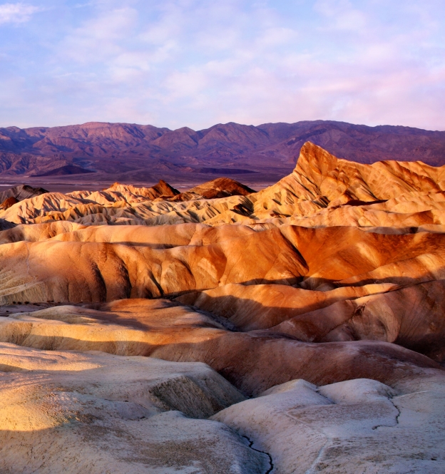 Rippling sand dunes at sunset