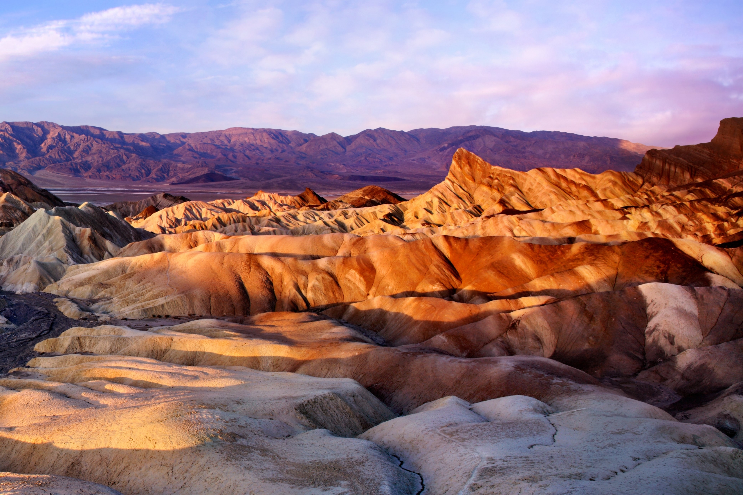 Rippling sand dunes at sunset