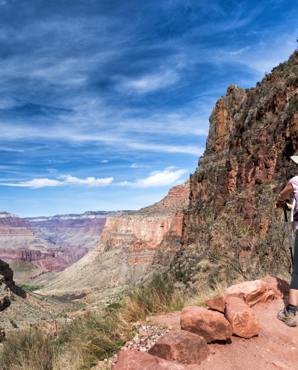 mature female hiker enjoying the view on the soutern rim of the Grand Canyon