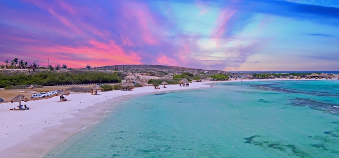 Aerial from Baby beach on Aruba island in the Caribbean Sea at sunset