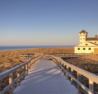 Soft light on the Old Harbour Life Saving Museum, Race Point Beach, Cape Cod. Photo taken at dusk in the dunes on a scenic beach in Provincetown, Massachusetts . Cape Cod is famous, worldwide, as a coastal vacation destination with some of New England's premier beach destinations