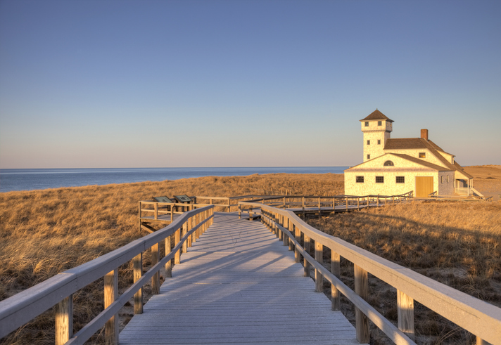 Soft light on the Old Harbour Life Saving Museum, Race Point Beach, Cape Cod. Photo taken at dusk in the dunes on a scenic beach in Provincetown, Massachusetts . Cape Cod is famous, worldwide, as a coastal vacation destination with some of New England's premier beach destinations