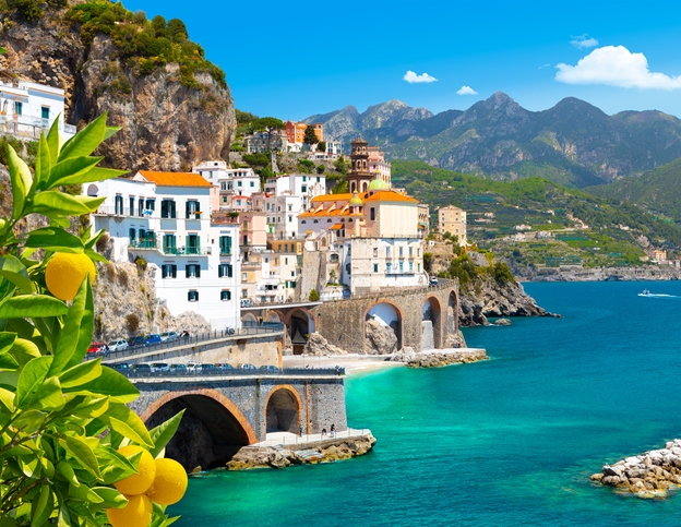 Morning view of Amalfi cityscape on coast line of mediterranean sea, Italy